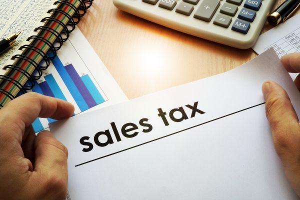 Image of a business person studying sales reports